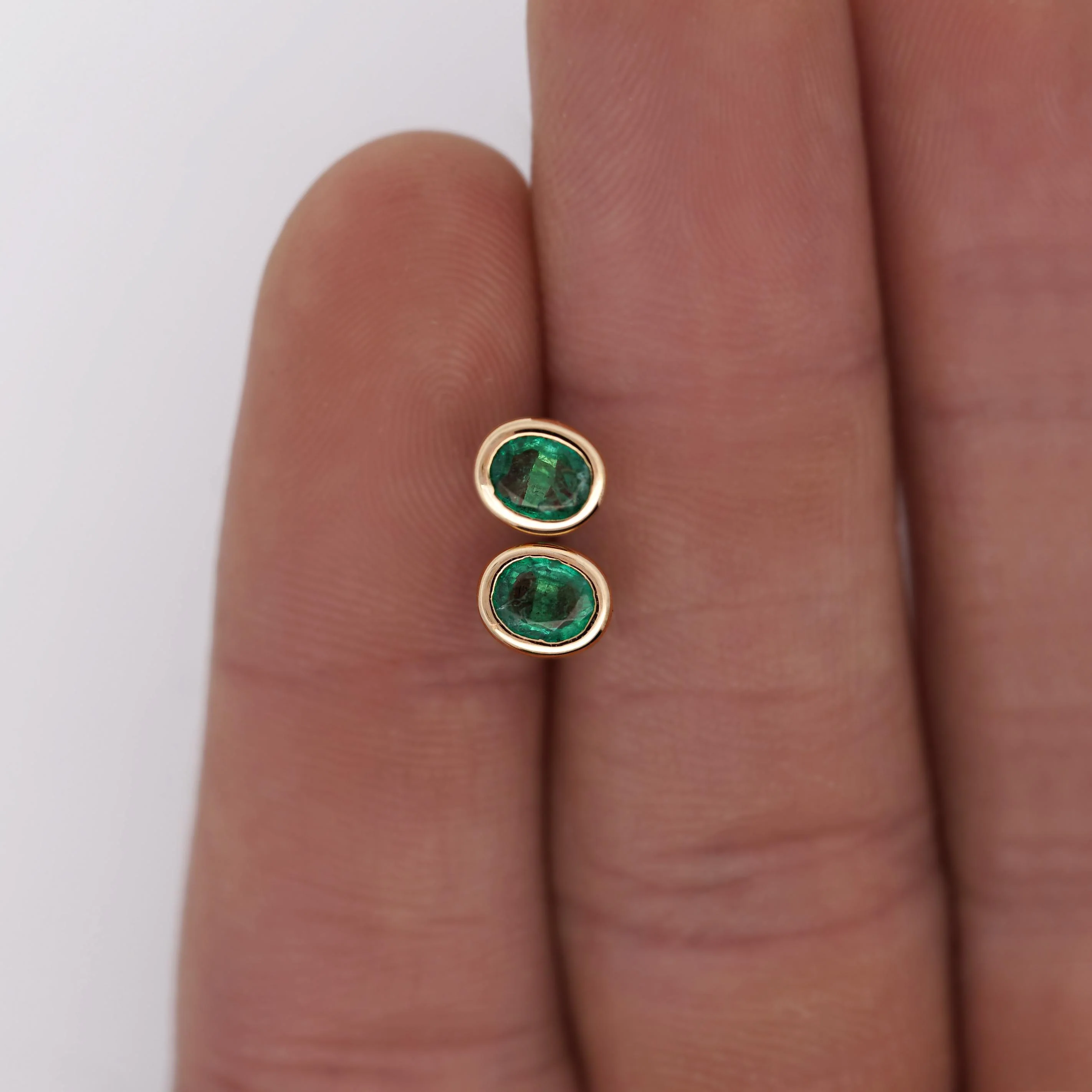 0.50 Carat Oval Emerald Bezel Set 18K Gold Stud Earrings - Image 3