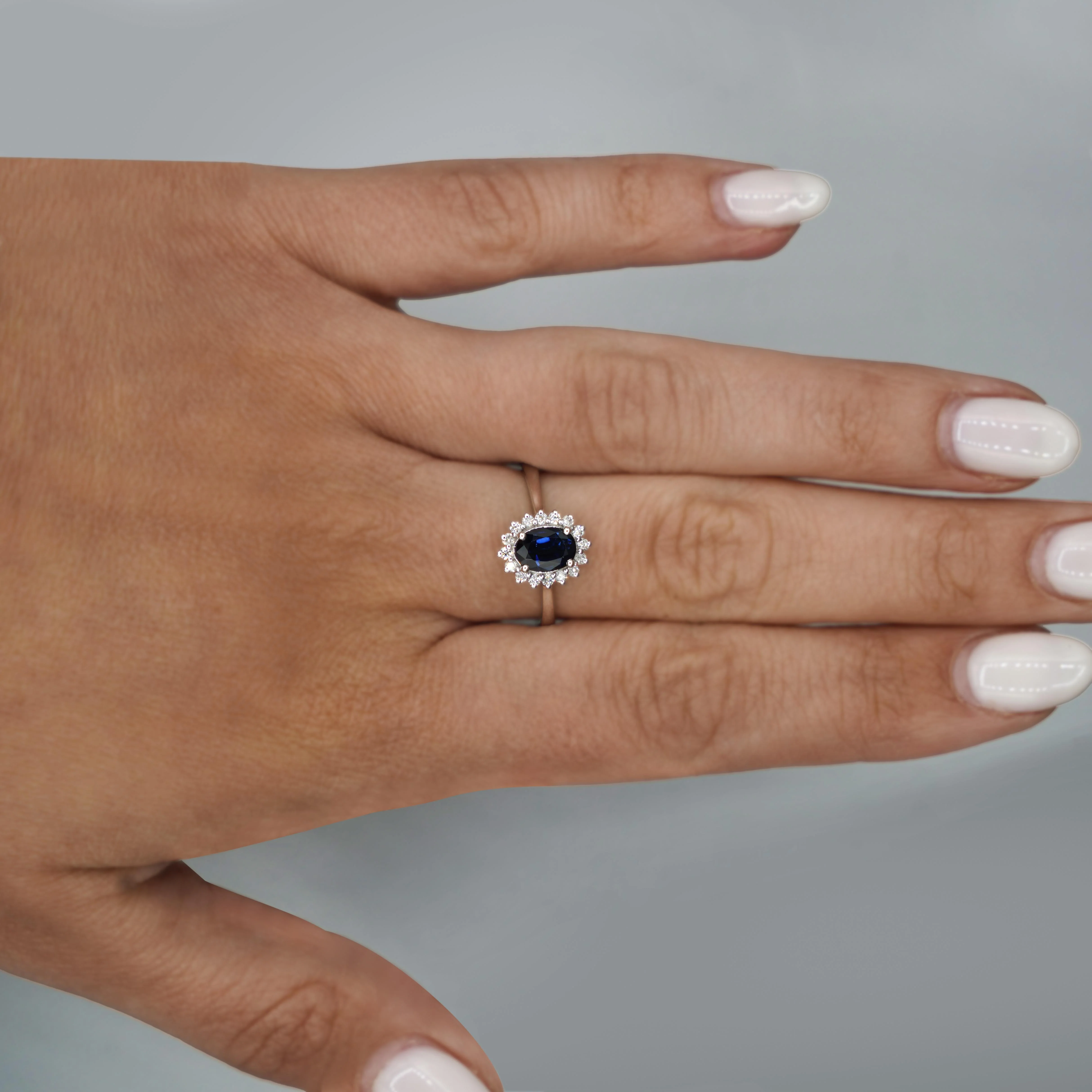 1.16 Carat Oval Blue Sapphire & Diamond Halo 18K White Gold Ring - Image 2