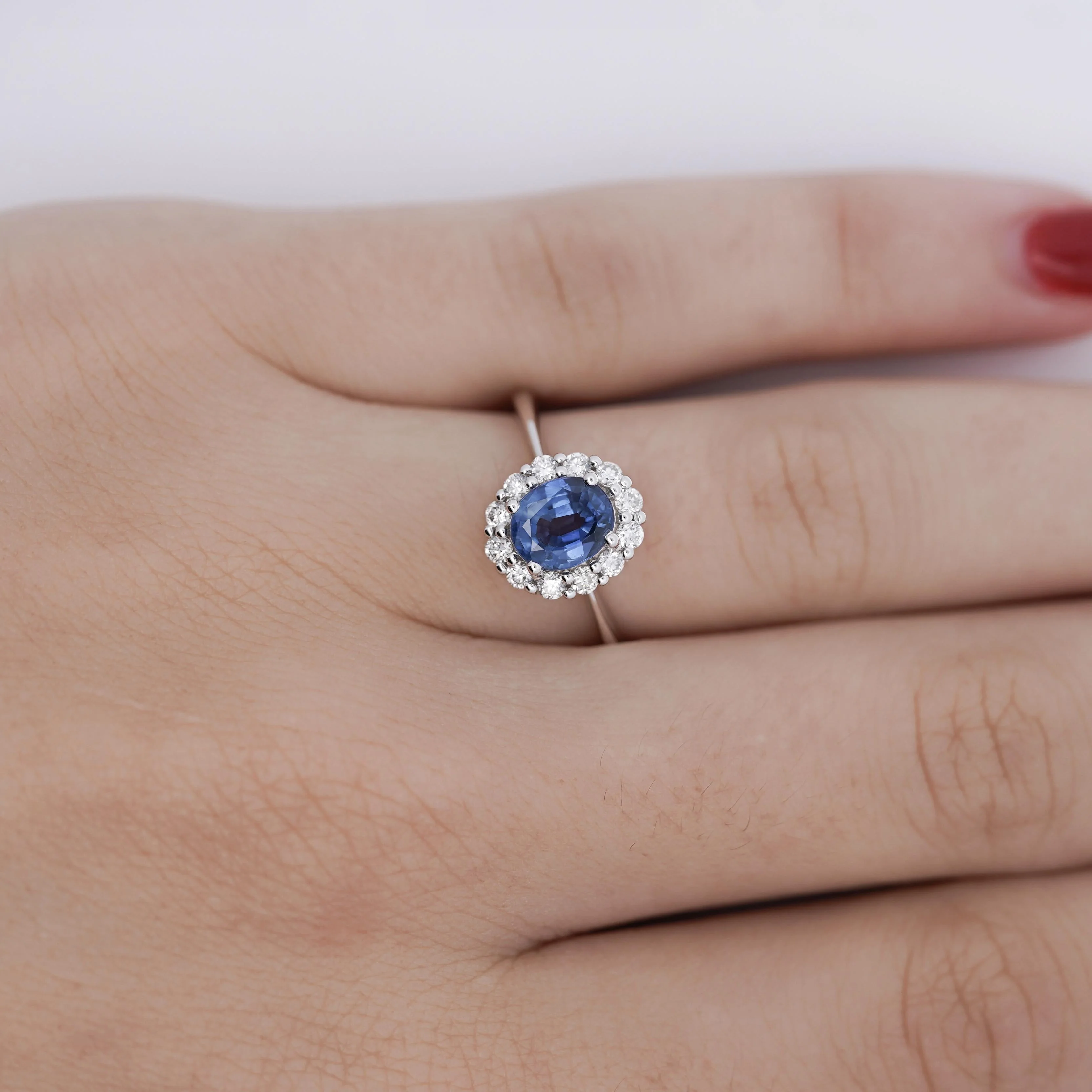 1.30 Carat Oval Deep Blue Sapphire & Round Diamond 18K White Gold Ring - Image 2