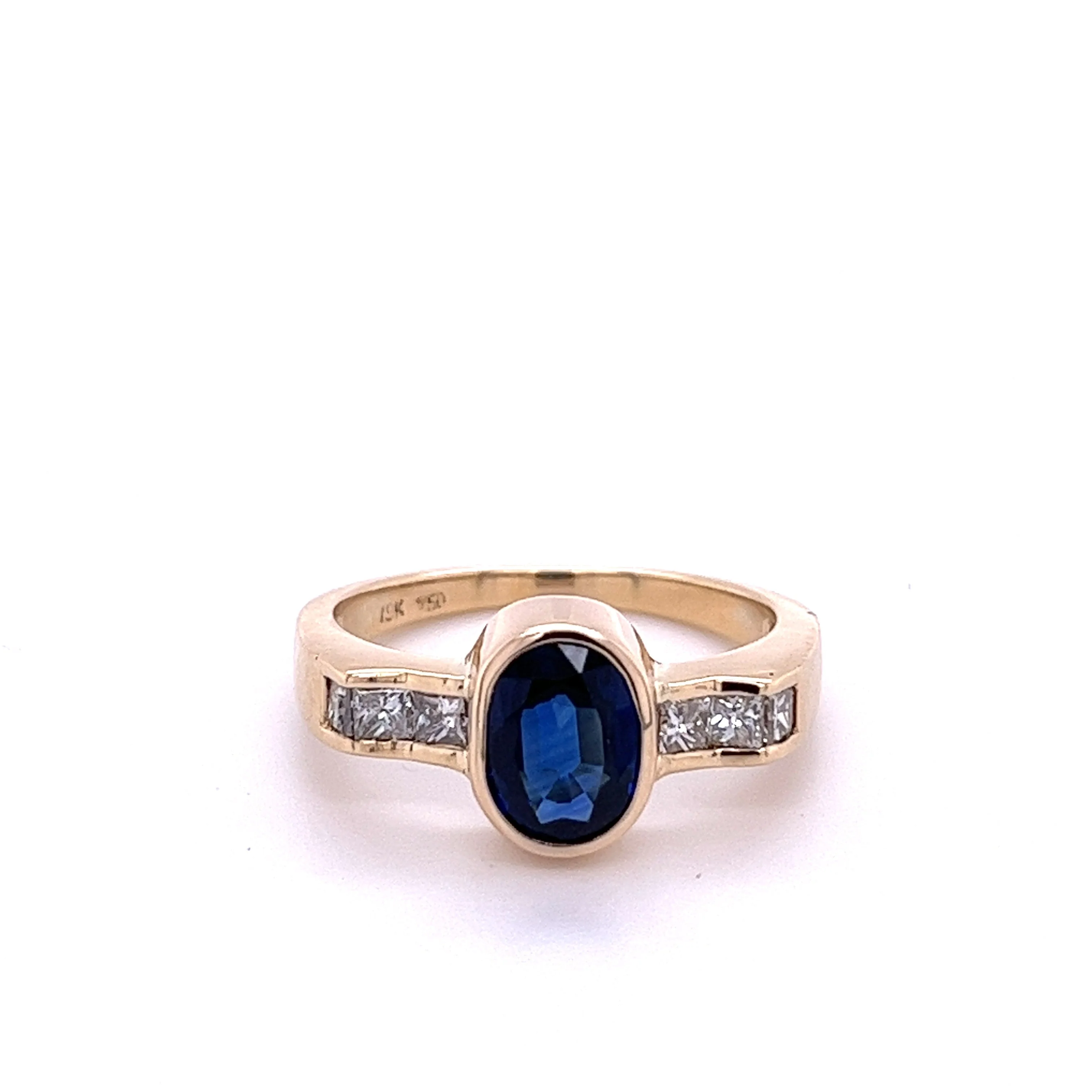 1.48 Carat Oval Cut Blue Sapphire With Princess Cut Diamond Ring in 18k Gold - Image 3
