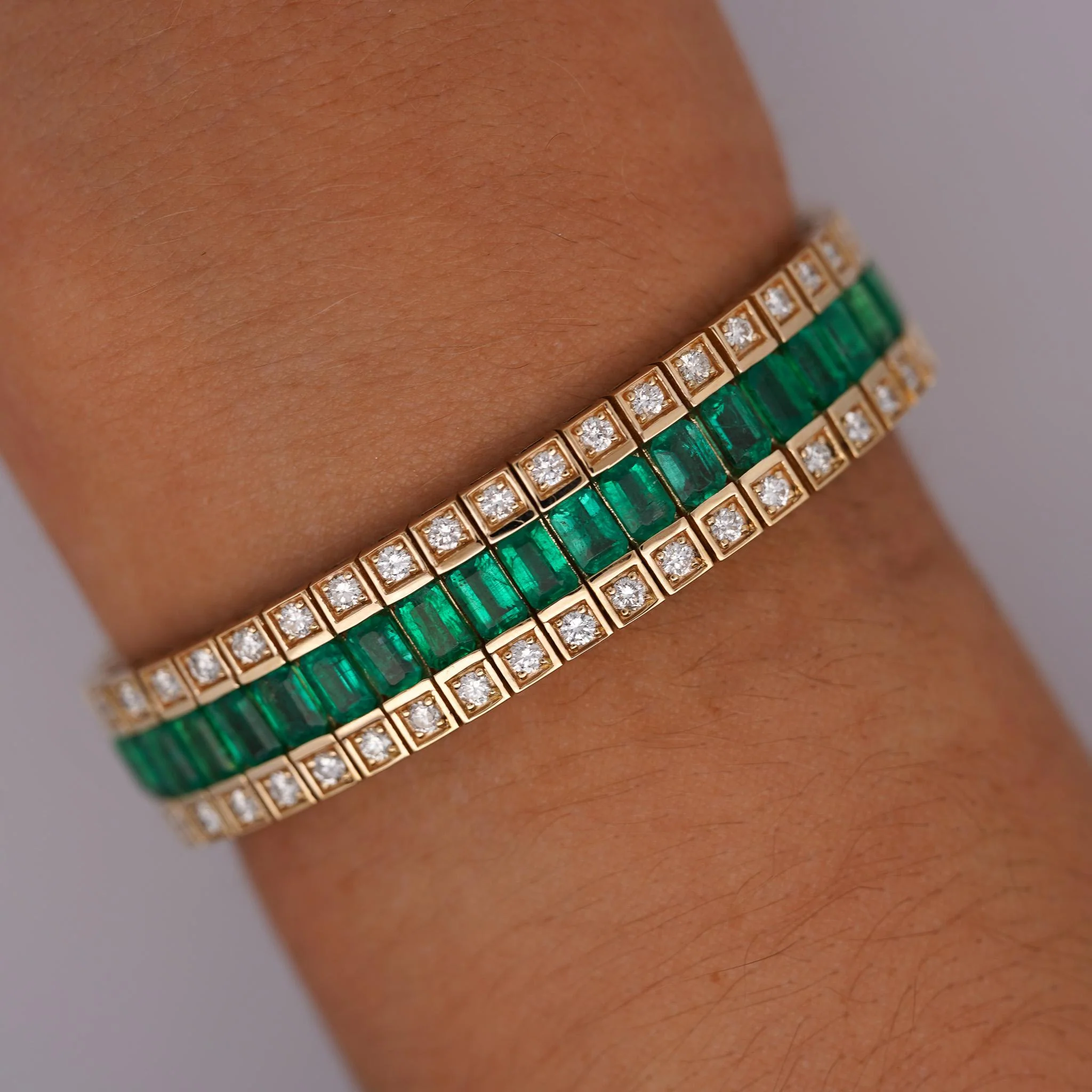 10.18 Carat Emerald and Diamond Baguette 14K Gold Three Row Bracelet - Image 2