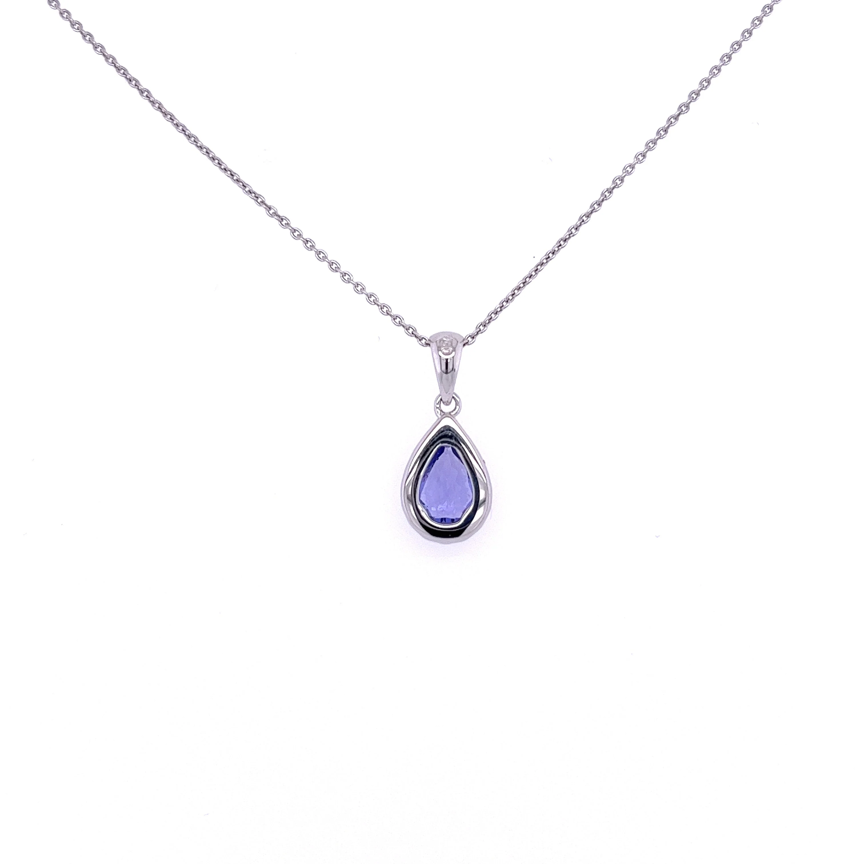 18K White Gold Tanzanite Drop Pendant With Diamond Halo - Image 4