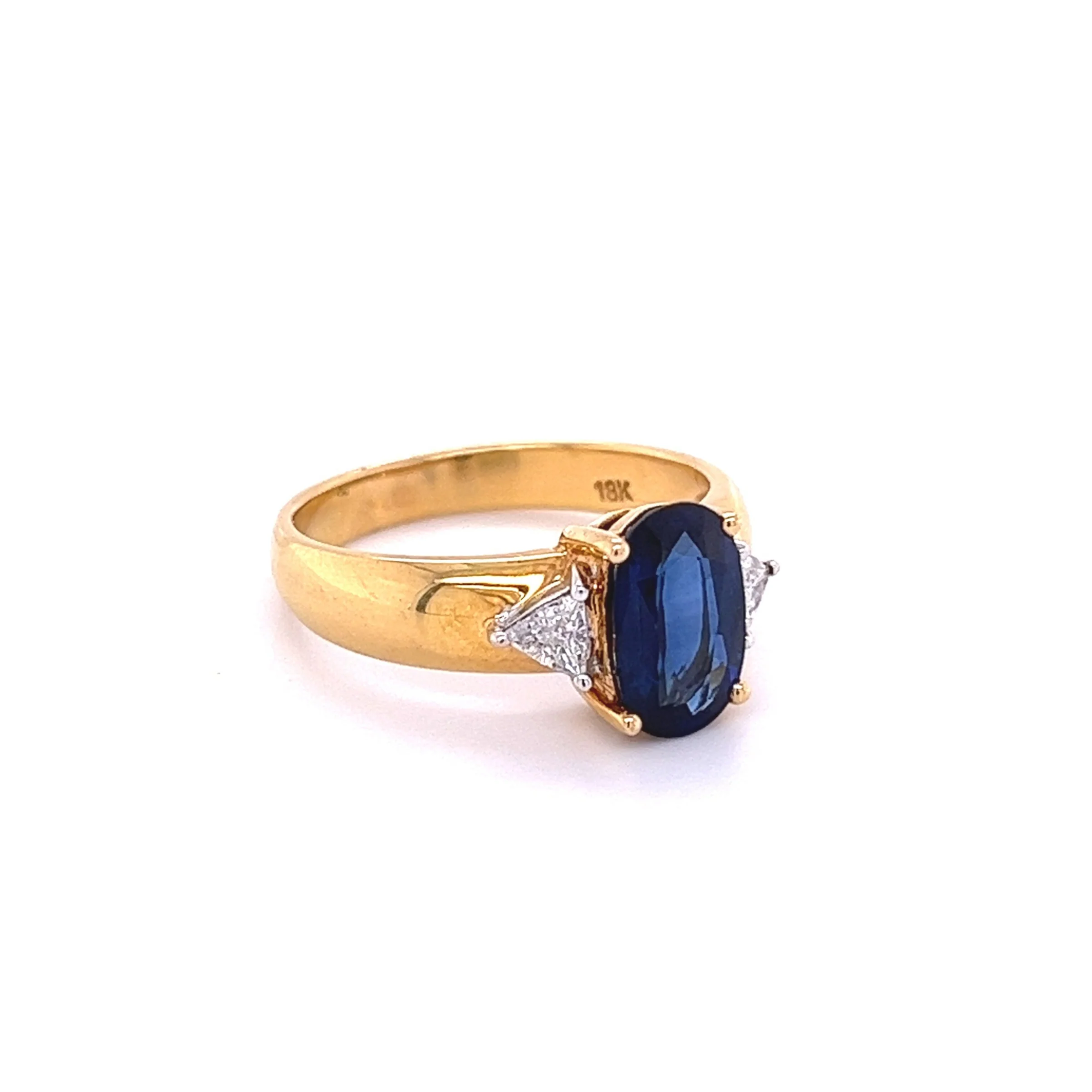 2.32 Carat Oval Cut Blue Sapphire with Trillion Cut Diamond Side stones in 18k Yellow Gold Ring - Image 3