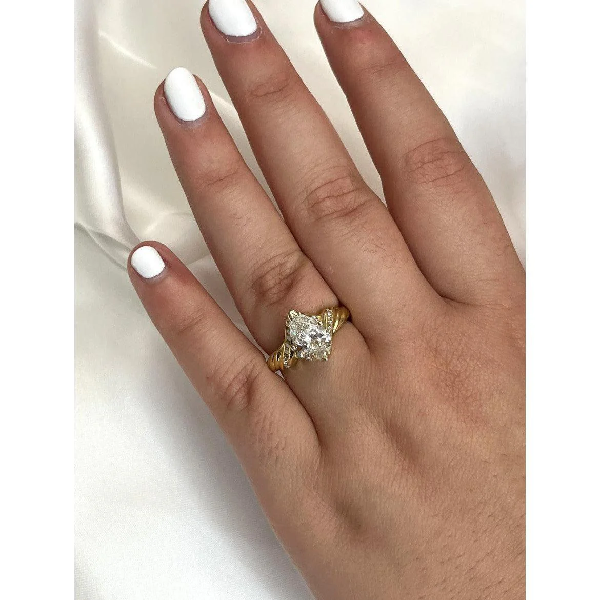 2.06 Carat Pear Cut Lab Grown Diamond in 18K Gold Twisted Crossover Ring - Image 4