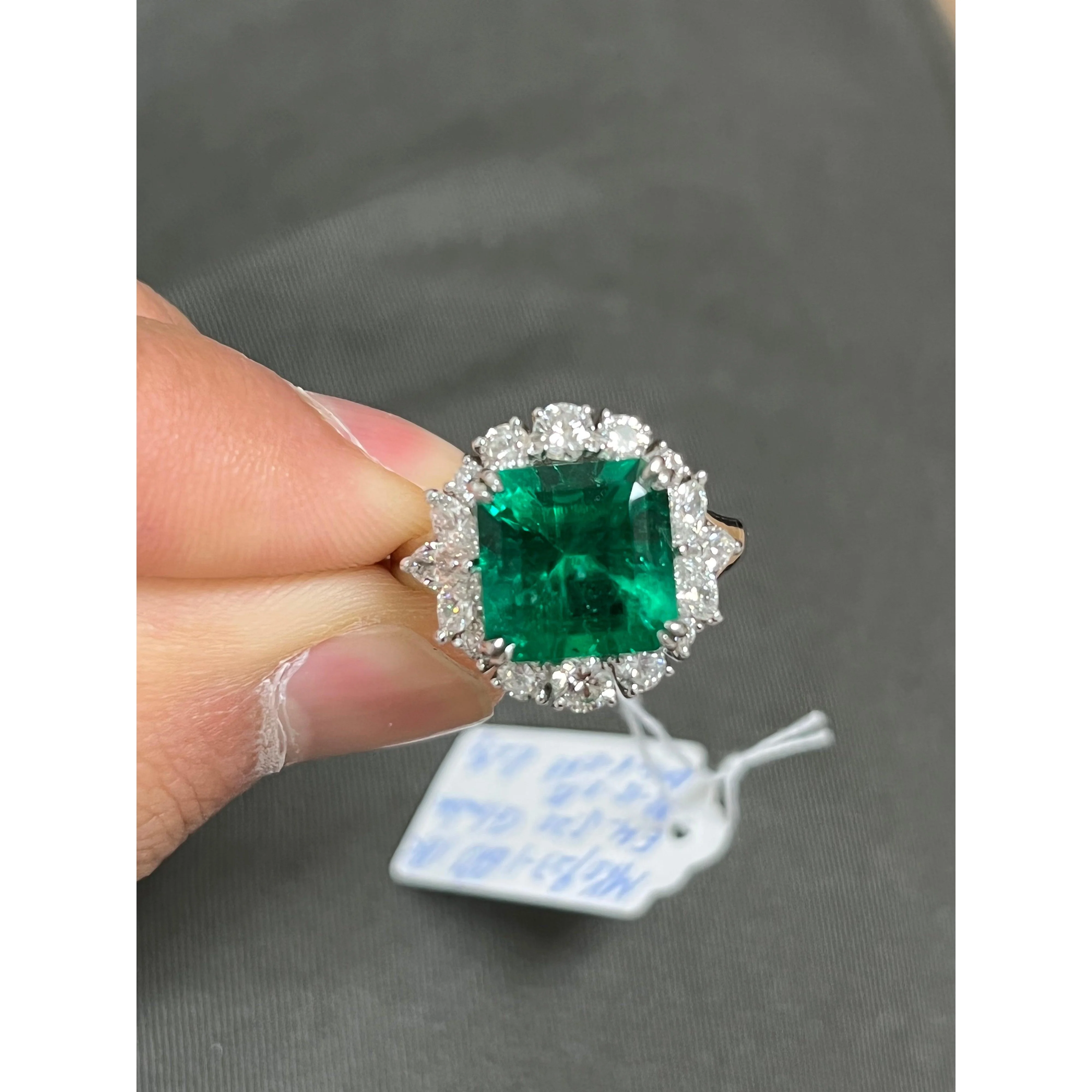 5.20 carat Minor Oil Colombian Emerald and Diamond Halo Ring - Image 3
