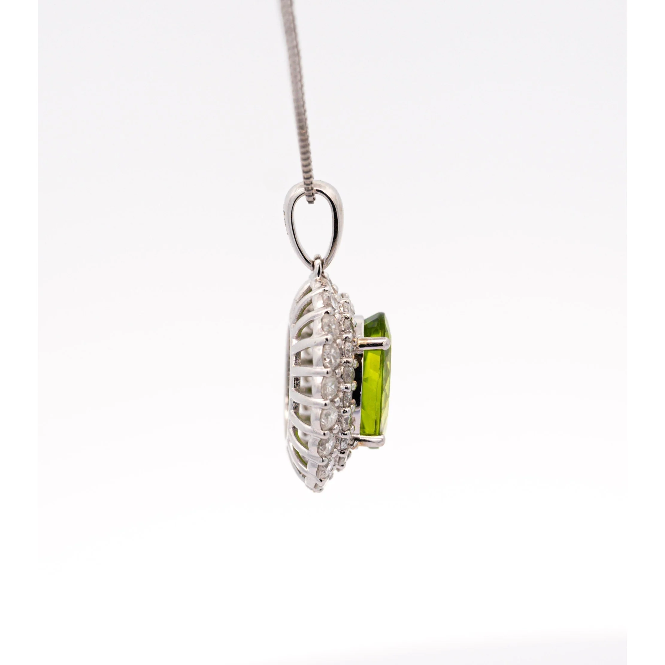 5.03 Carat Oval Cut Peridot Pendant with Round Cut Diamond Halo in 18K White Gold - Image 7