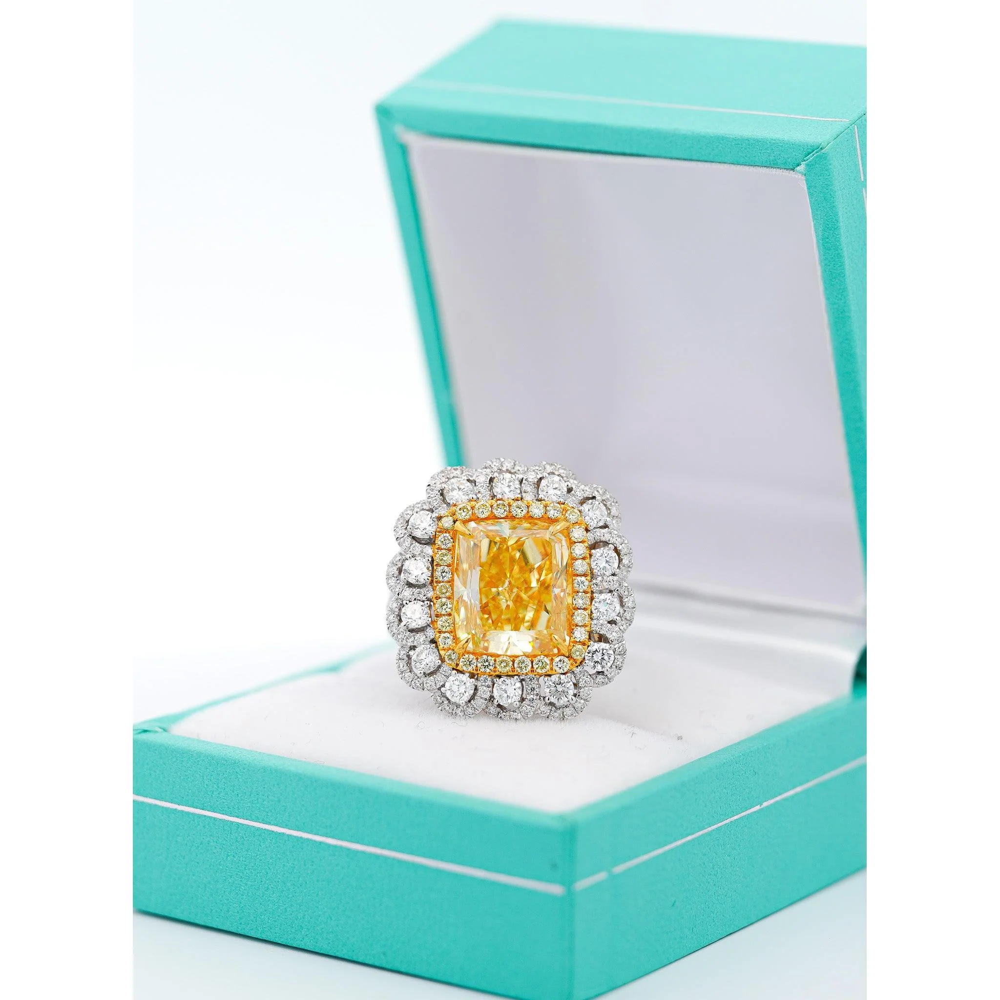 7 Carat Fancy Intense Yellow Radiant Cut Diamond and Diamond Halo Ring | GIA Certified - Image 4
