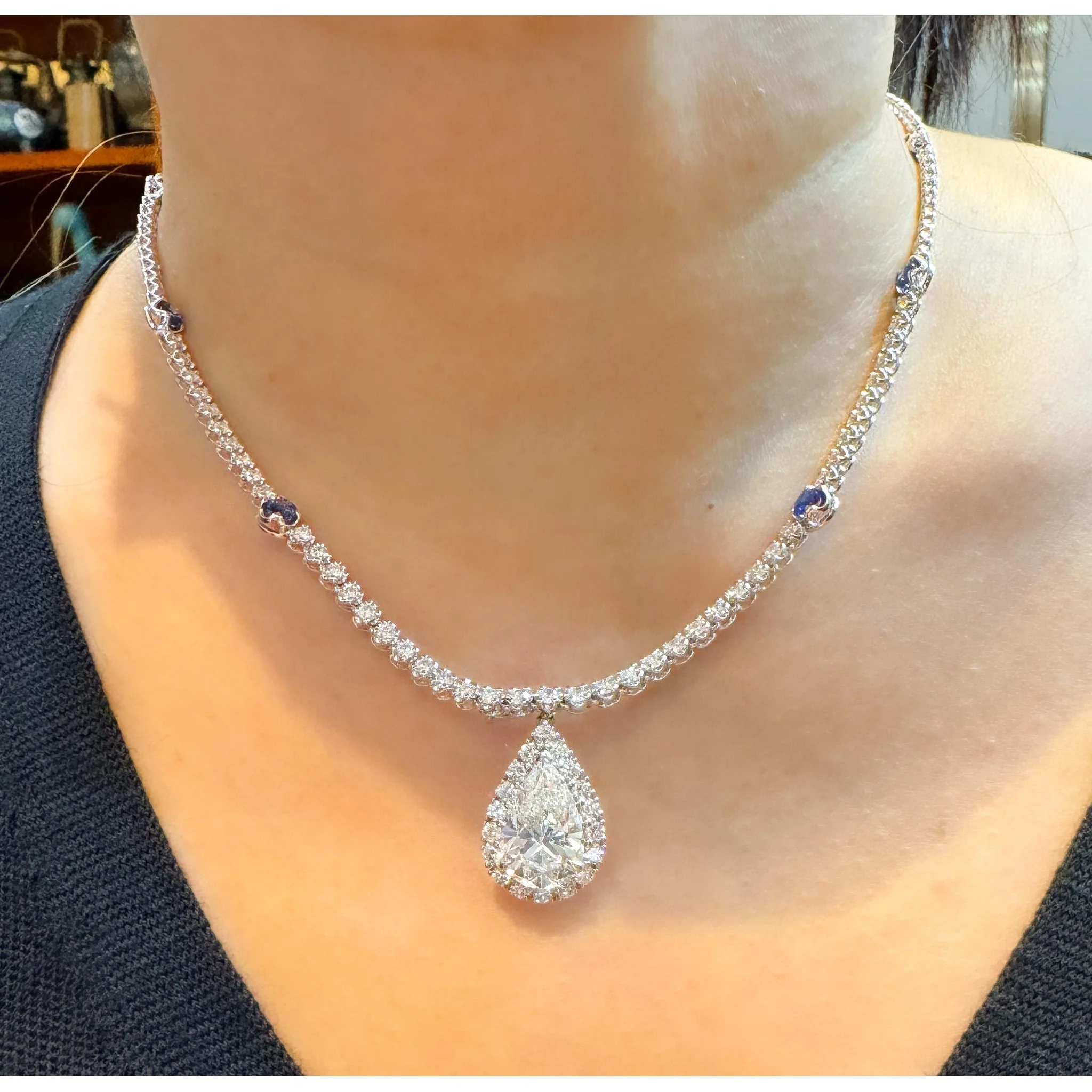 EGL Certified 5.02 Carat Pear Diamond Pendant and Diamond Halo & Sapphire Detail - Image 9