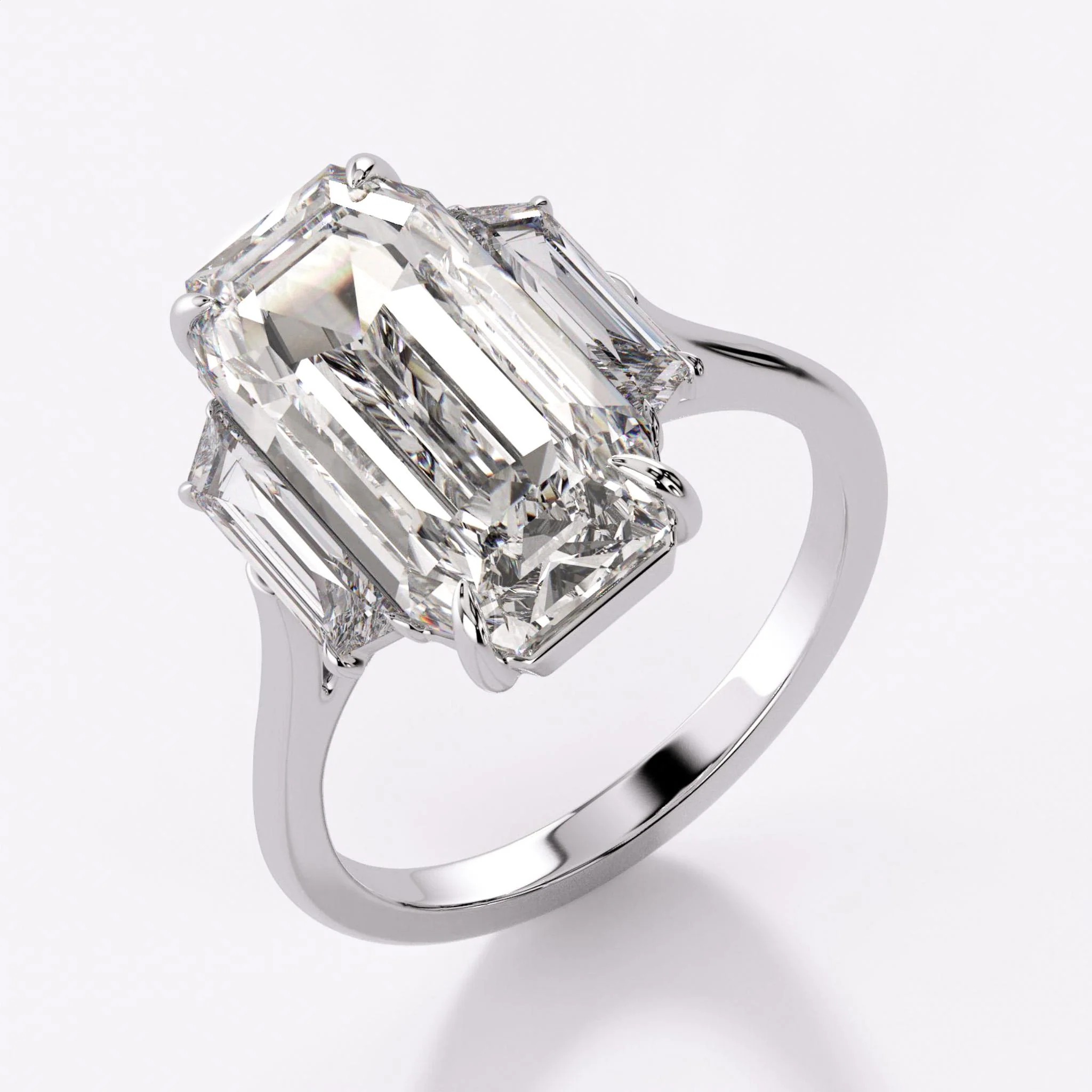 GIA 6.16 Carat Emerald Cut Diamond and Trapezoid Three Stone Engagement Ring - Image 2