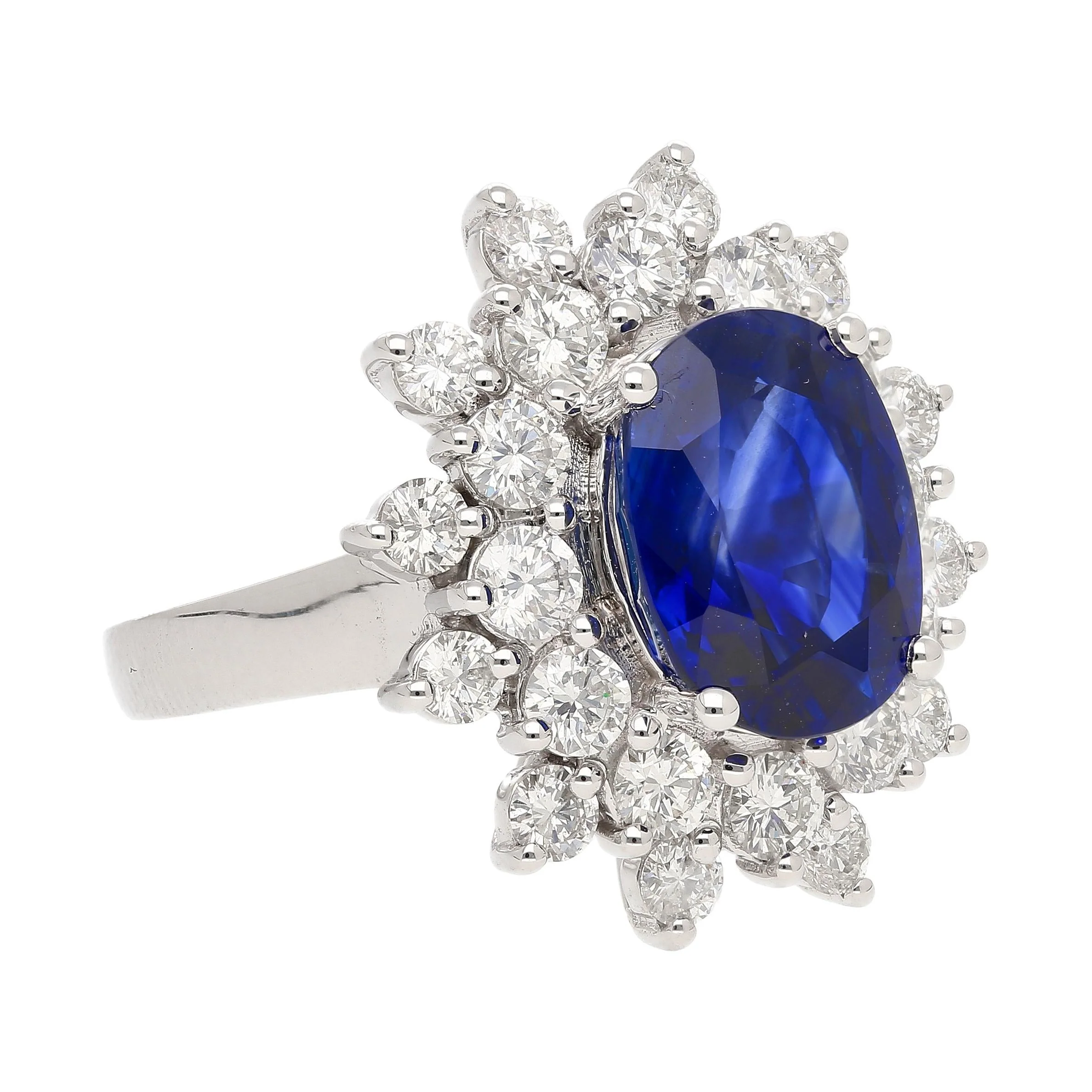 GRS Certified 5.79 Carat Oval Royal Blue Sapphire and Diamond Halo Ring - Image 2