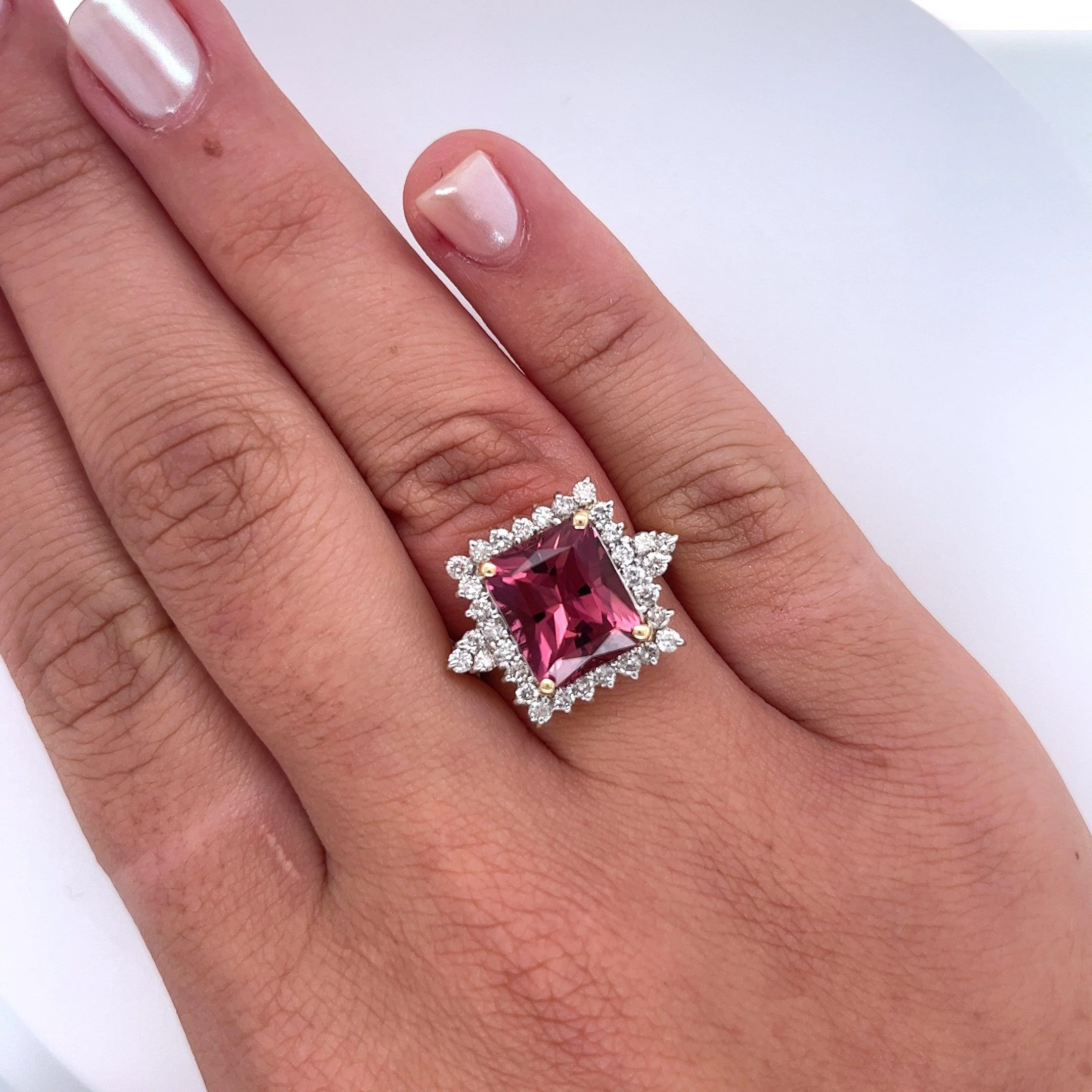 Vivid Pink 7 Carat Radiant Cut Tourmaline Ring with Round Diamond Halo in 18K Gold - Image 2