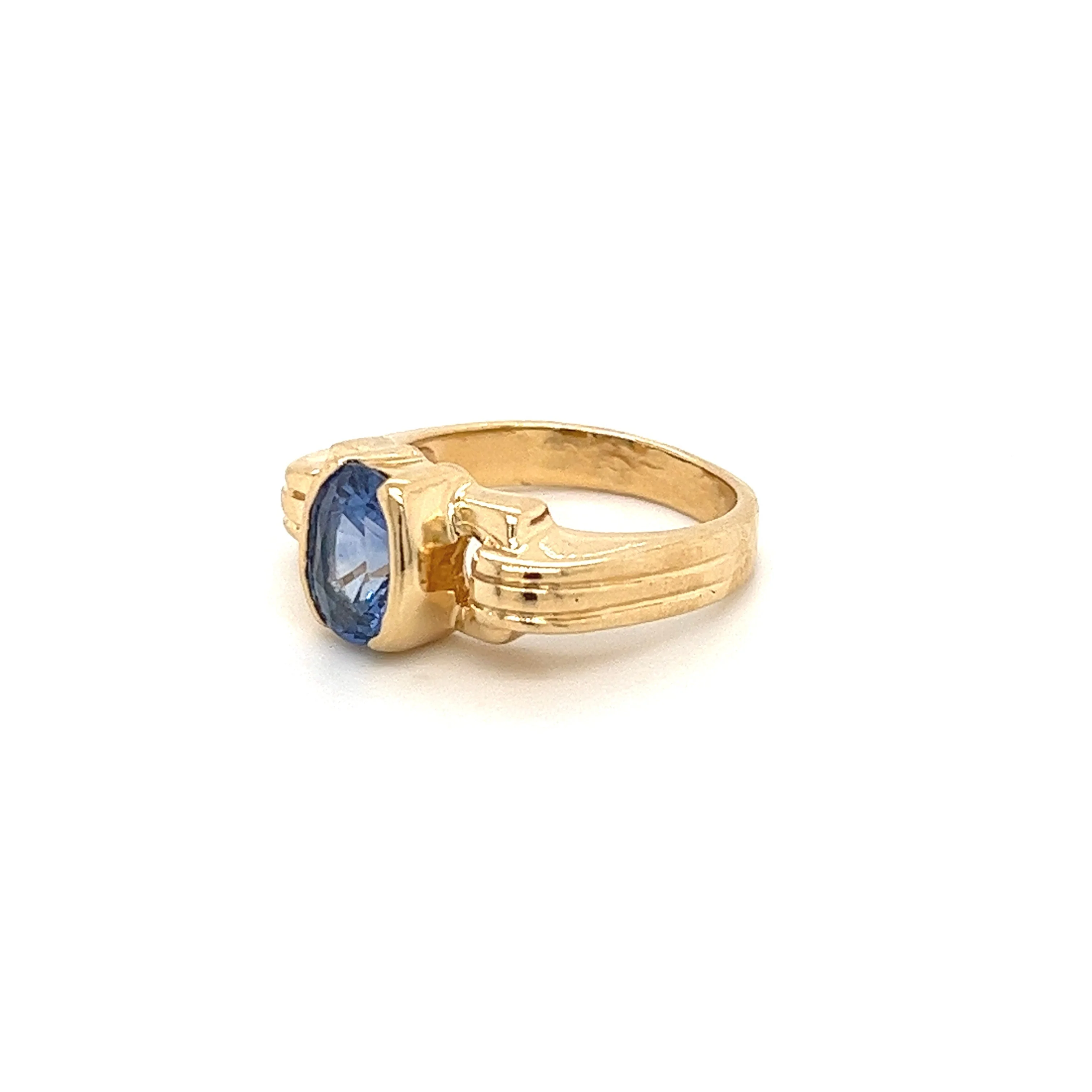Oval Cut Blue Sapphire Regal Band Ring in 18k | Half Bezel Set - Image 3