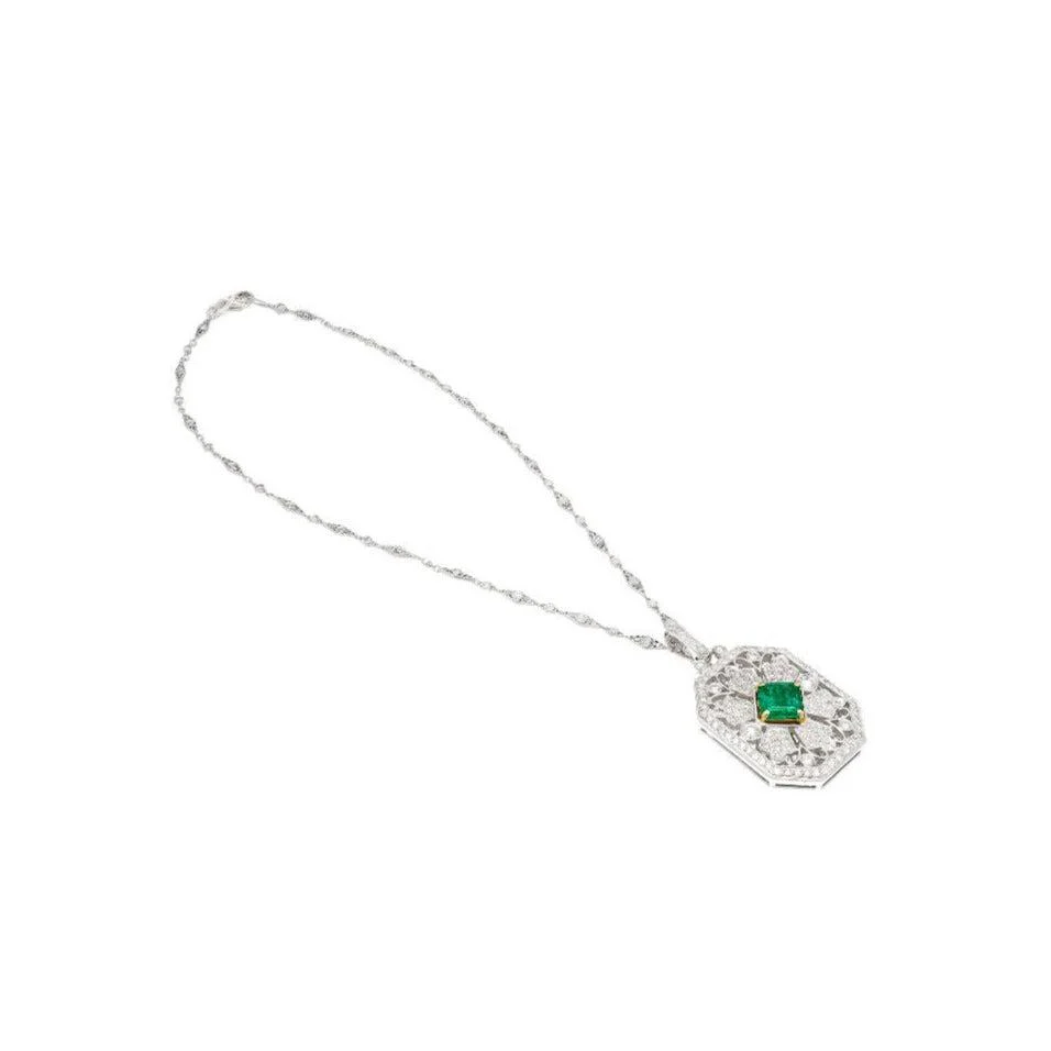 Vintage Carved Platinum 3.16 Carat Vivid Green Minor Oil Emerald Pendant with 4 CTTW in Diamonds - Image 2