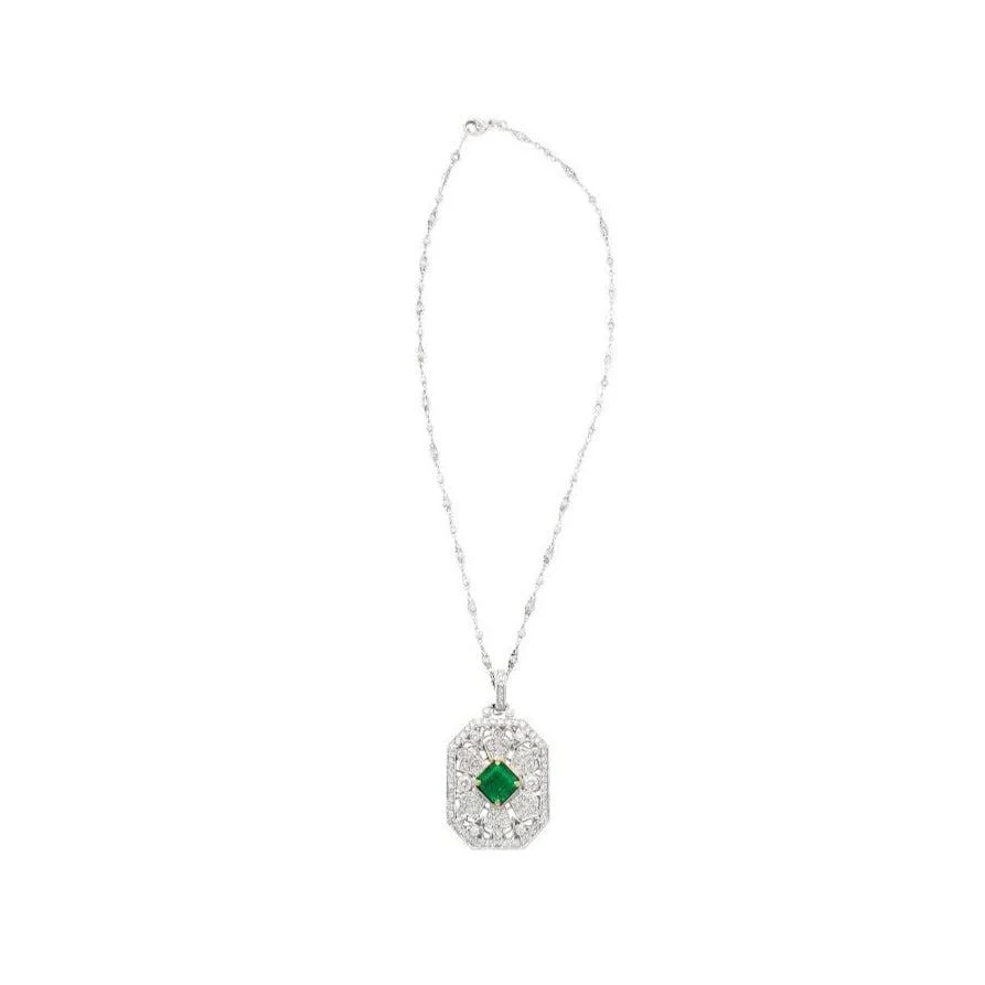 Vintage Carved Platinum 3.16 Carat Vivid Green Minor Oil Emerald Pendant with 4 CTTW in Diamonds - Image 3